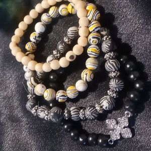 Wooden & silicone expandable bracelets beaded with a Celtic cross